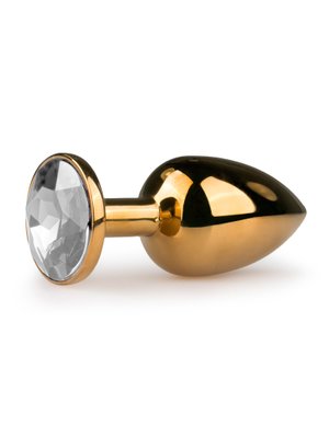 Goudkleurige metalen buttplug met transparante steen